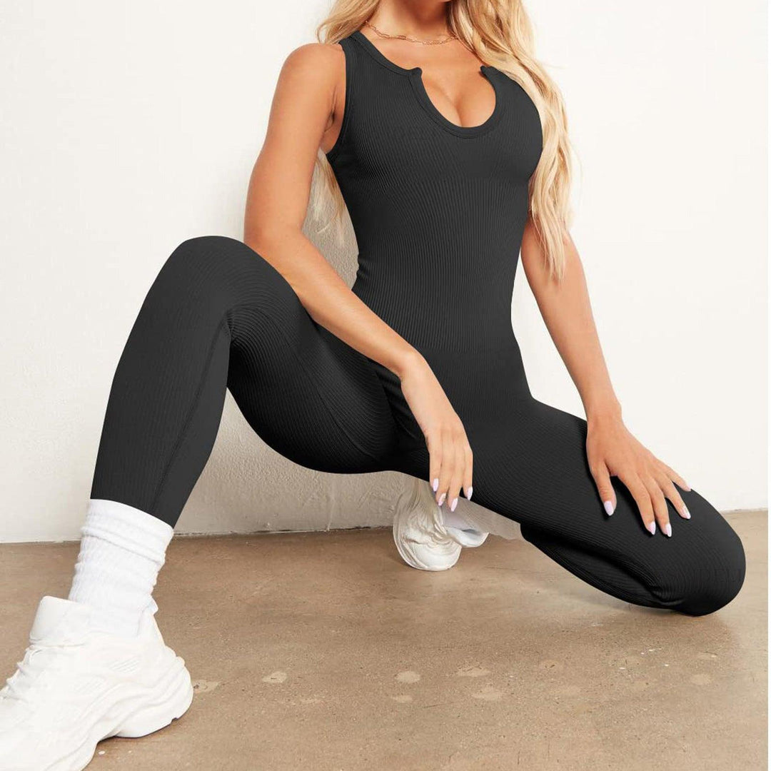 Black ribbed sleeveless vest-style jumpsuit with scoop neck and fitted long legs