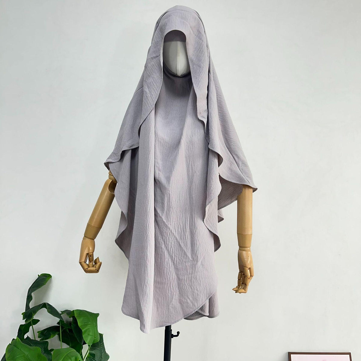 Women’s draped scarf shawl cover with hooded neckline, light gray shade