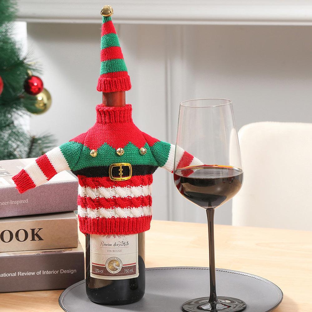 Knitted bottle decoration: green striped tree sweater with white-red sleeve stripes
