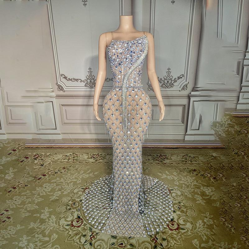 Rhinestone strapless fishtail gown in light blue, fitted bodice with trumpet hem.
