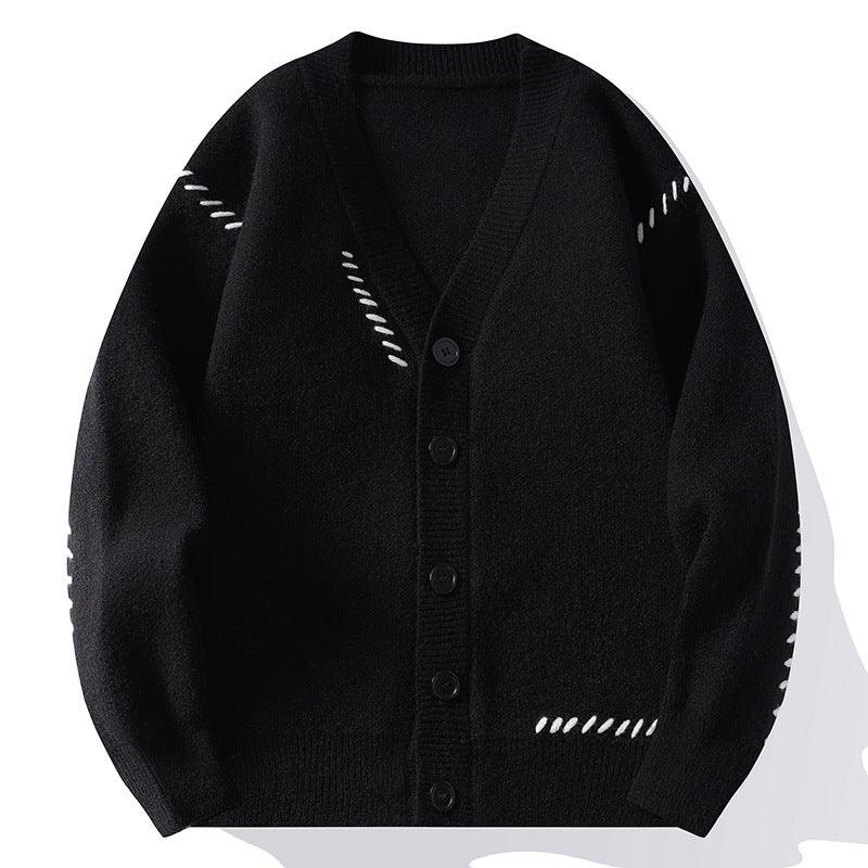 Black knitted cardigan coat, V-neck, button front, ribbed trim, contrast stitched arm detail.