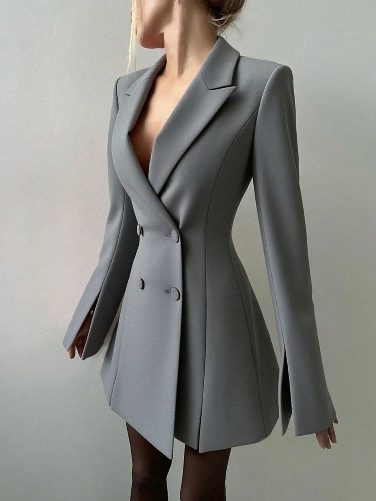 Gray double-breasted blazer dress with cinched waist, double-button front and long sleeves