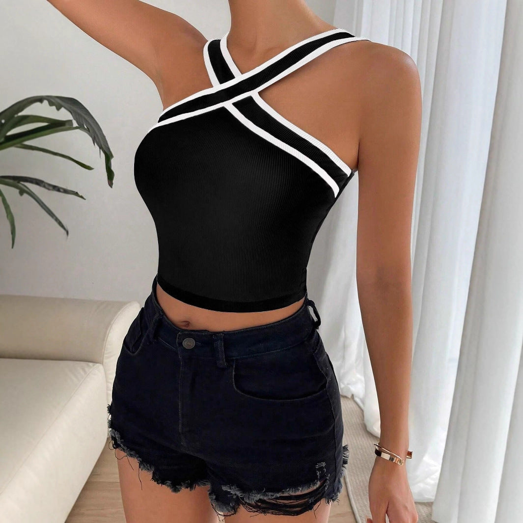 Women’s black sleeveless tank top with crisscross V-neck and white contrast trim