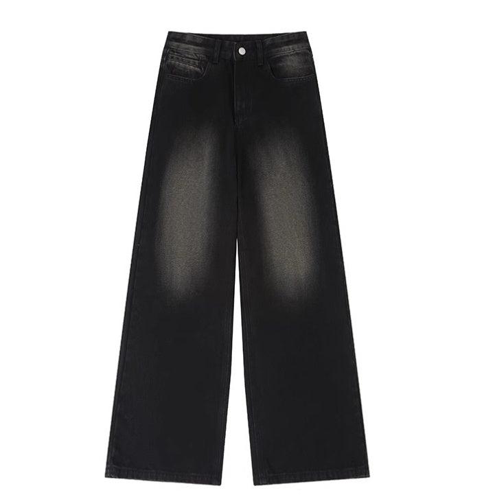 Black distressed denim wide-leg jeans with button waist and slant pockets