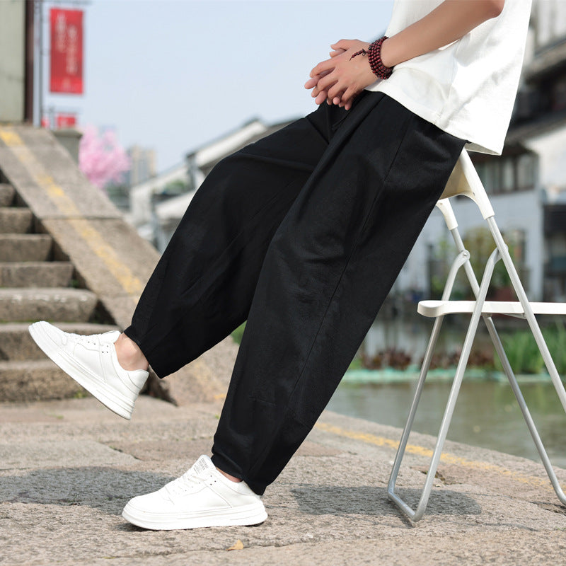 Men's harem pants, black, wide loose legs with gathered cuffs and side pockets
