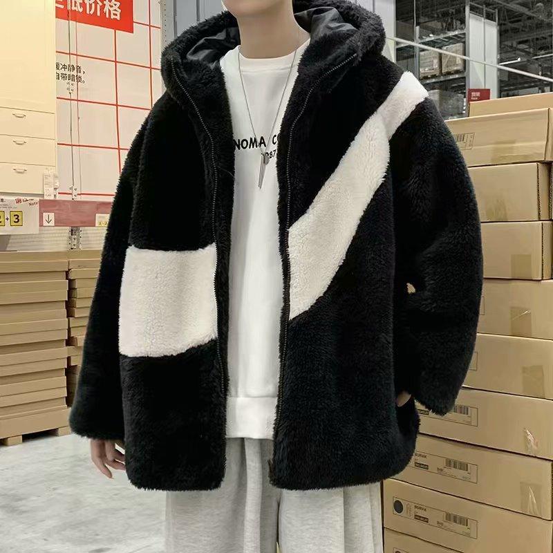 Black hooded sherpa coat with diagonal white panel and zip-front