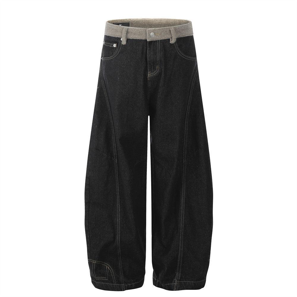 Wide-leg black denim pants with light gray waistband and relaxed straight legs