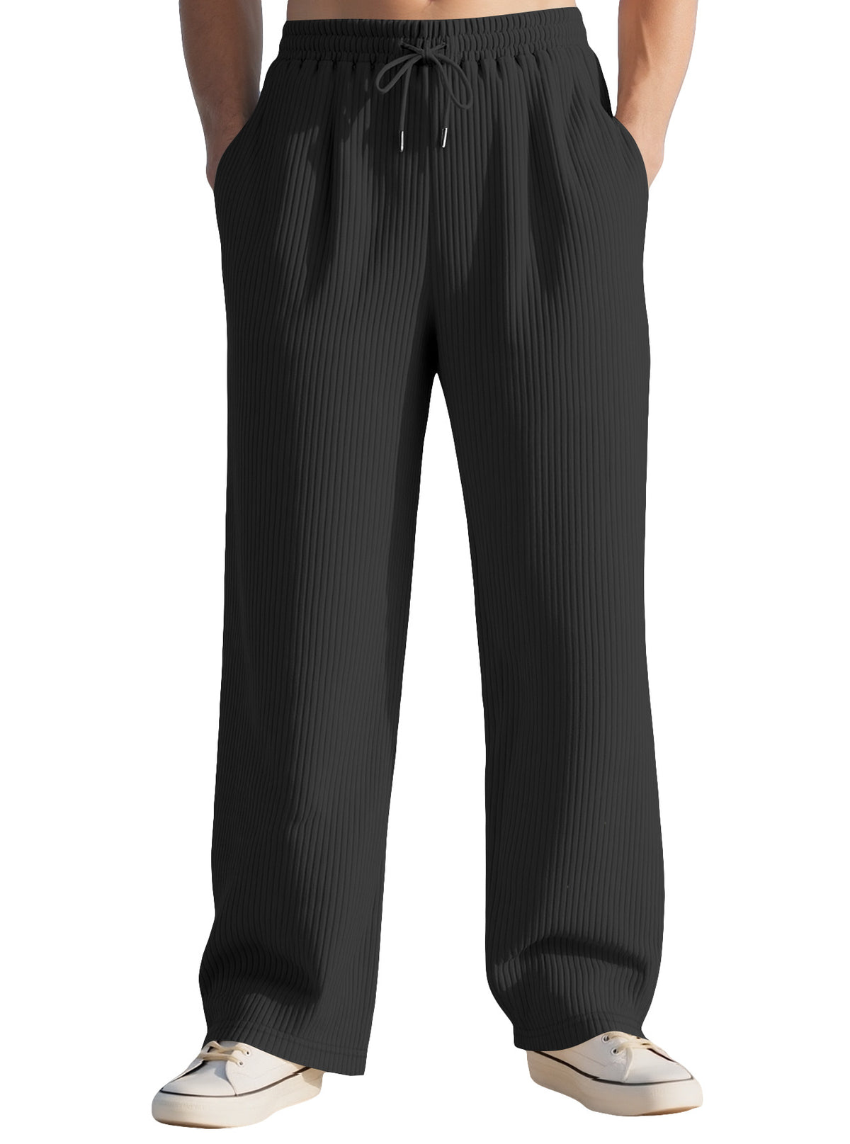Black wide-leg sports sweatpants with elastic waistband and thin drawstring ties.