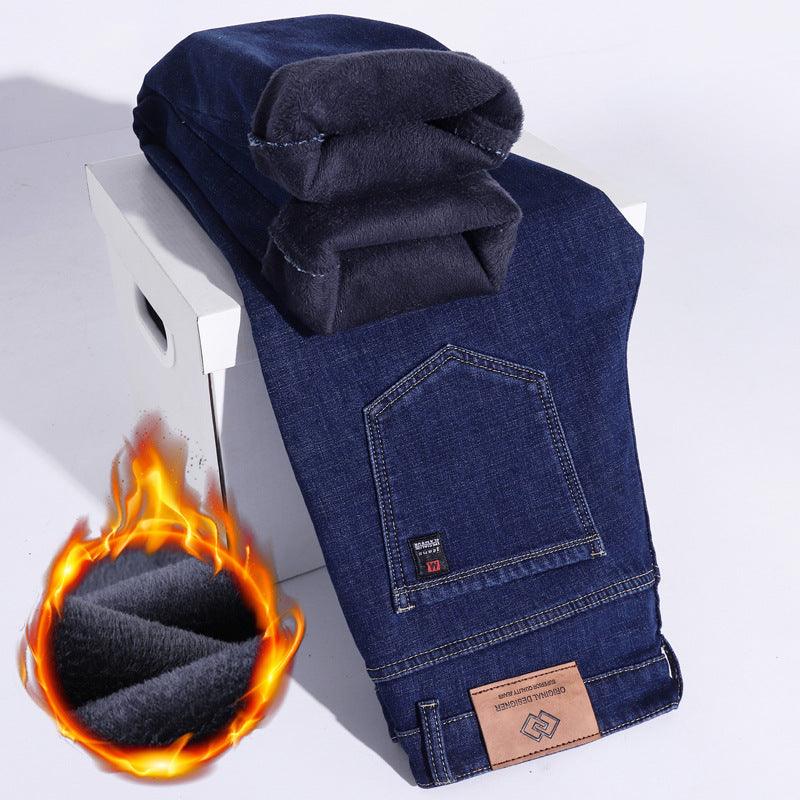 Folded men's winter fleece-lined thick jeans, deep blue denim with stitched pocket panel