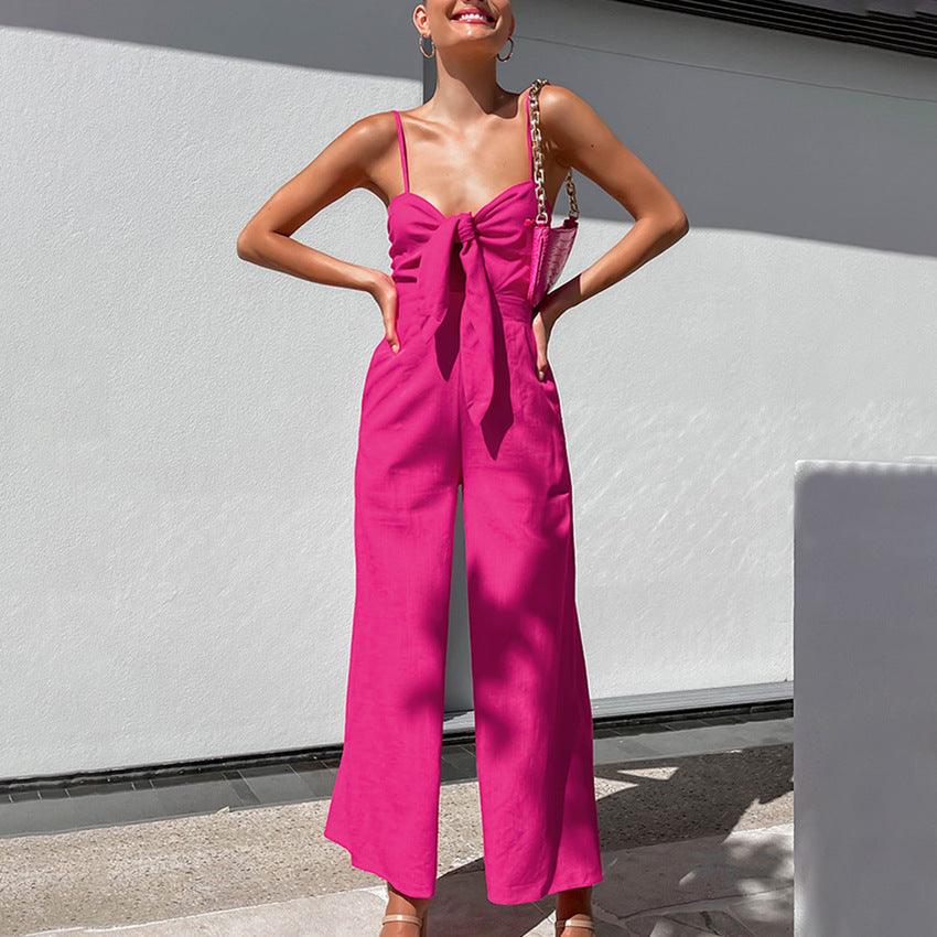 Pink sling wide-leg jumpsuit with bow-tie neckline and wide cropped legs