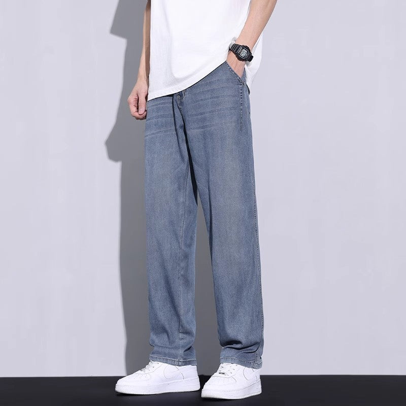 Washed blue-gray wide-leg long pants with side pockets and stitched seams.