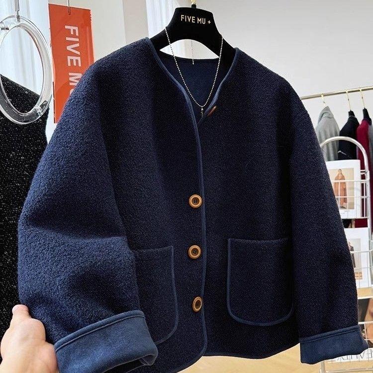 Dark crewneck cropped lambswool jacket with button front and two patch pockets