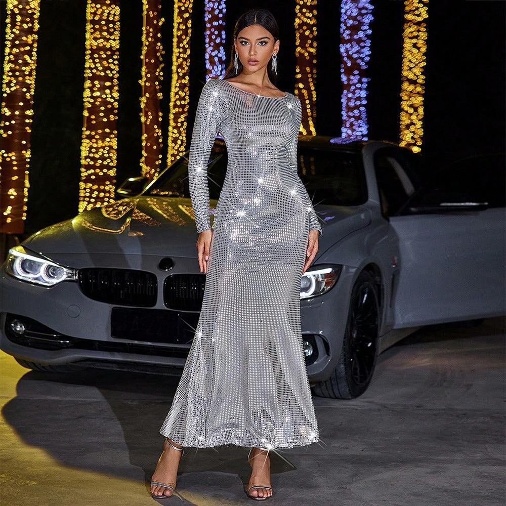 Silver long-sleeve sequin evening dress with fitted bodice and flared skirt