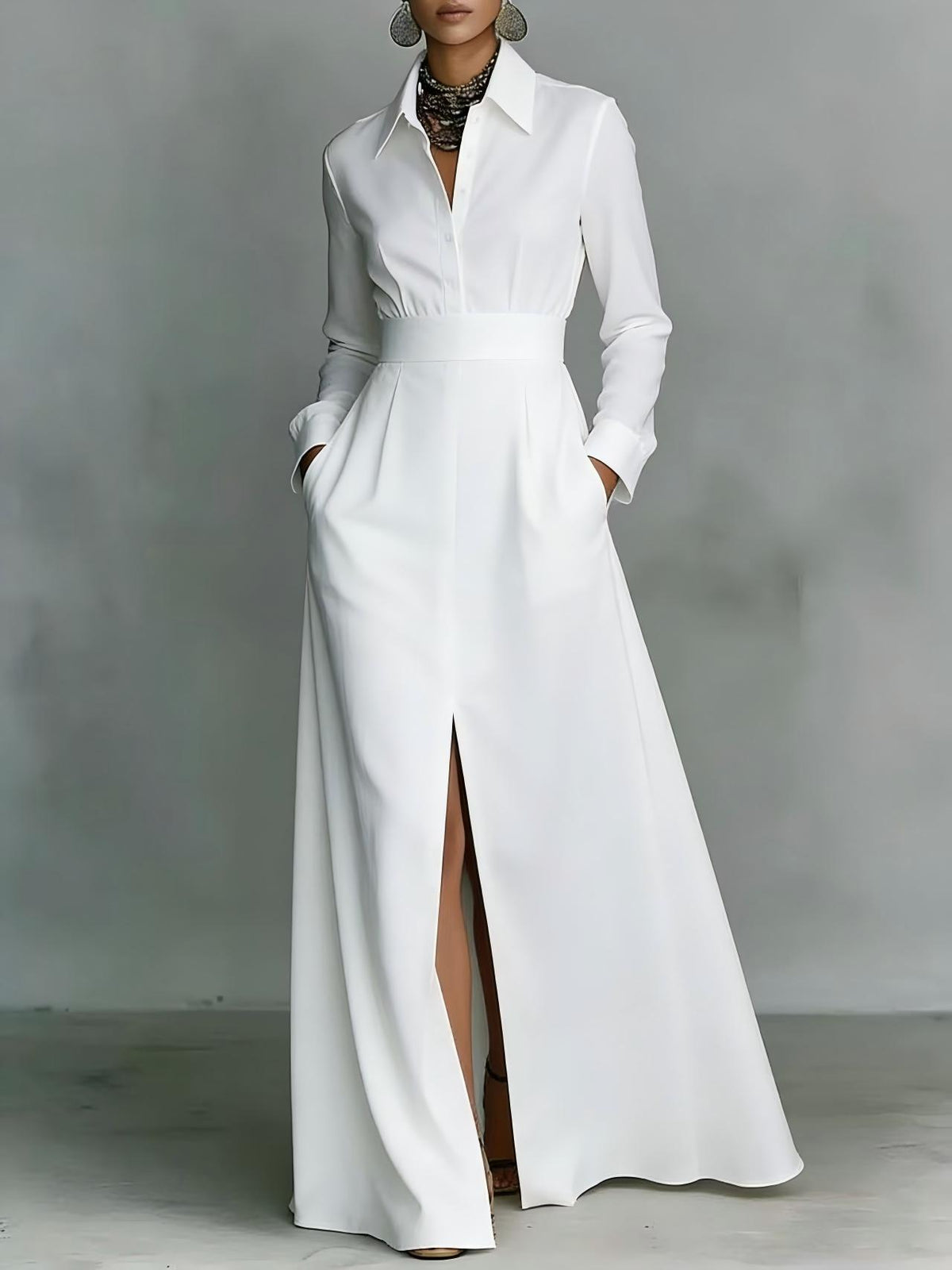 White lapel split A-line maxi dress with long sleeves and fitted waist