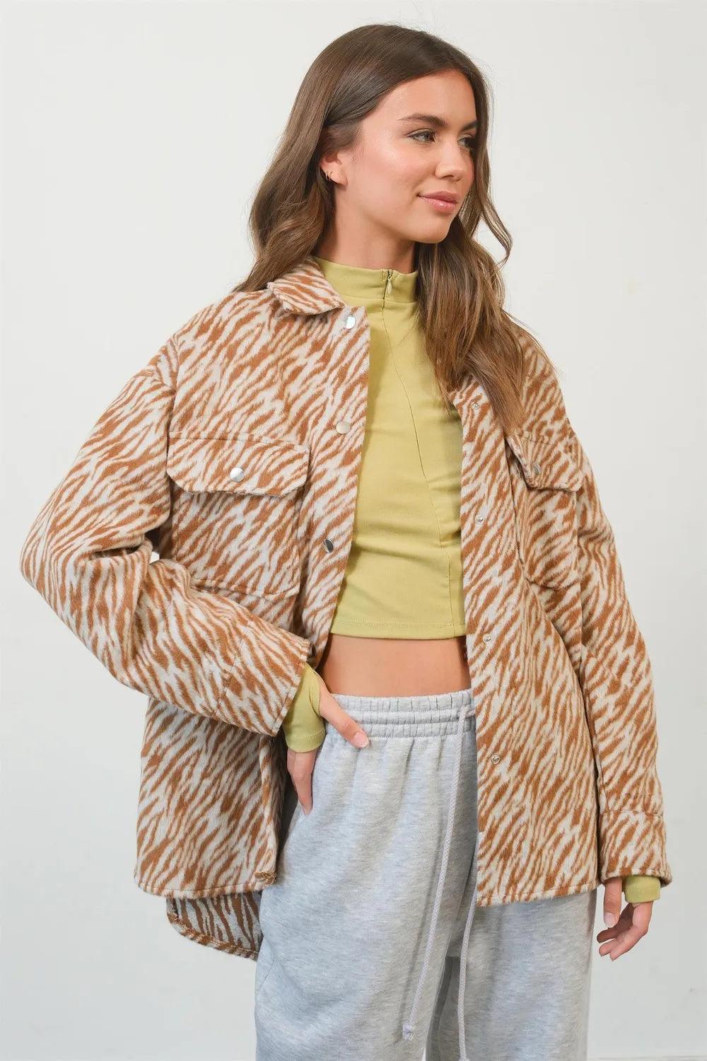 Camel zebra-print long-sleeve snap shacket worn over lime top and gray joggers