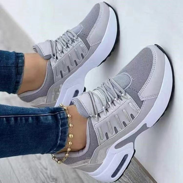 Zapatillas deportivas con cordones y tacón de cuña para mujer