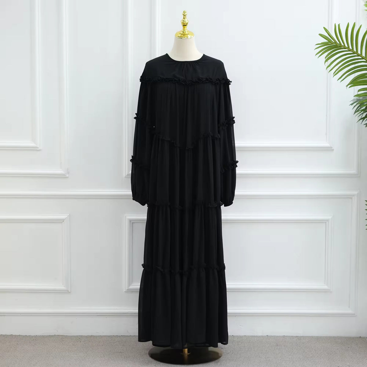 Lace-Trim Long-Sleeve Tiered Maxi Dress — black dress on mannequin