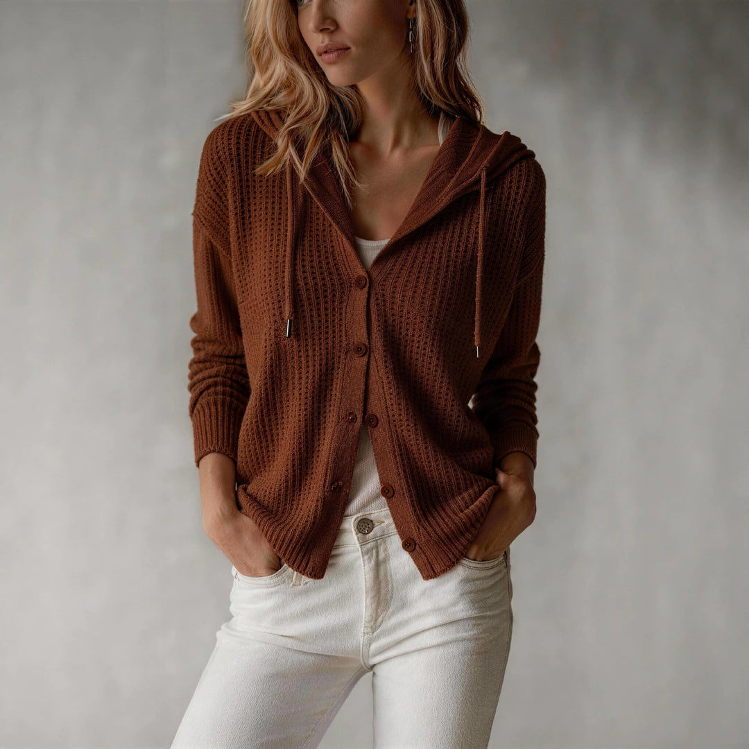 Women’s hooded knit cardigan in rust brown, button-front with front pockets and drawstring hood.