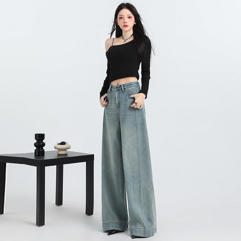 Light blue wide-leg denim jeans with straight cut, front pockets