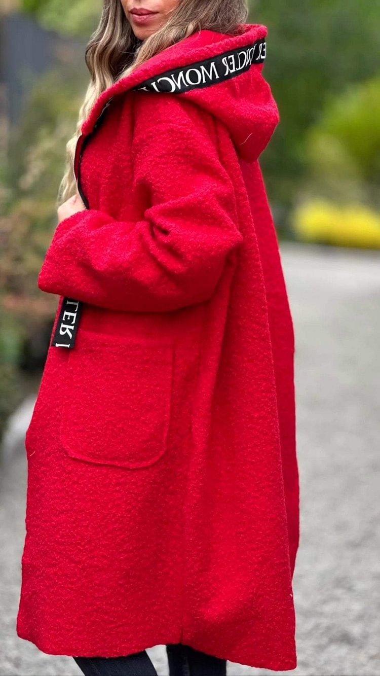 Women’s hooded lamb wool coat in bright red, with lettering-trim hood and side pockets