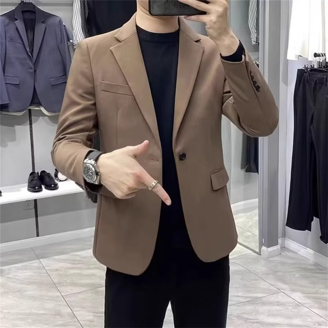 Men's suit jacket in light tan with notch lapels and front button closure