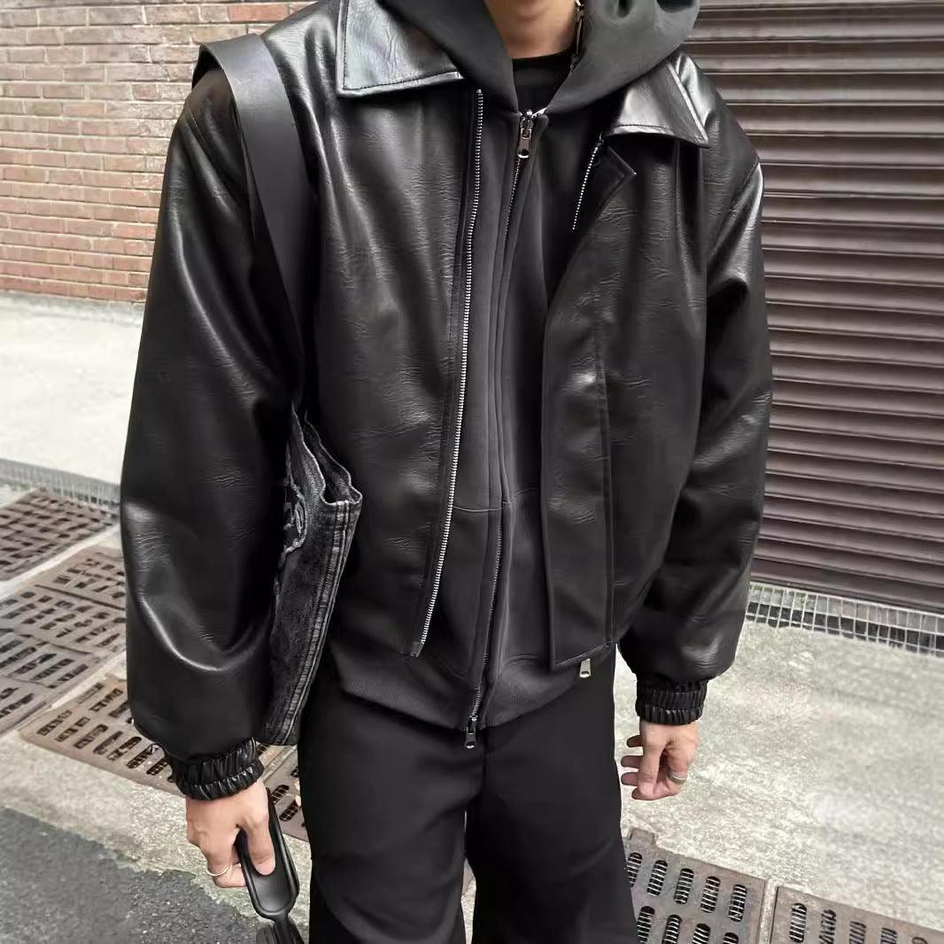 Black PU leather short jacket with padded shoulders, zip front, stand collar, rib cuffs