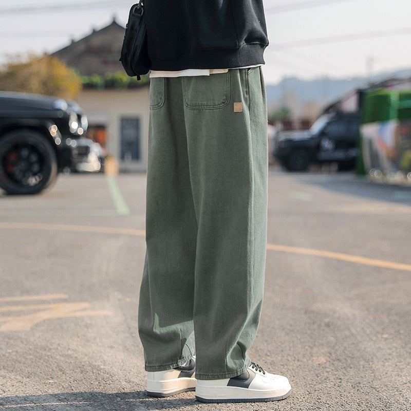 Men's loose cargo pants in army green, straight leg, cuffed hems, front pocket detail