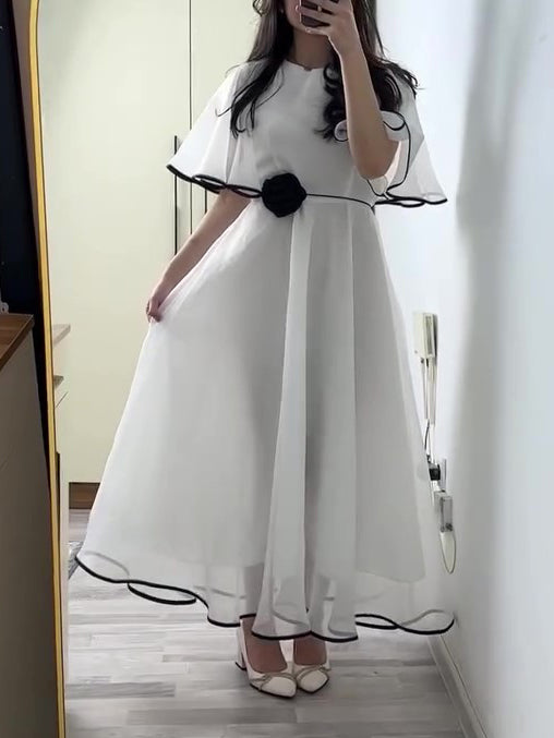 Women's White Chiffon Maxi Dress With Black Trim And Floral Accent