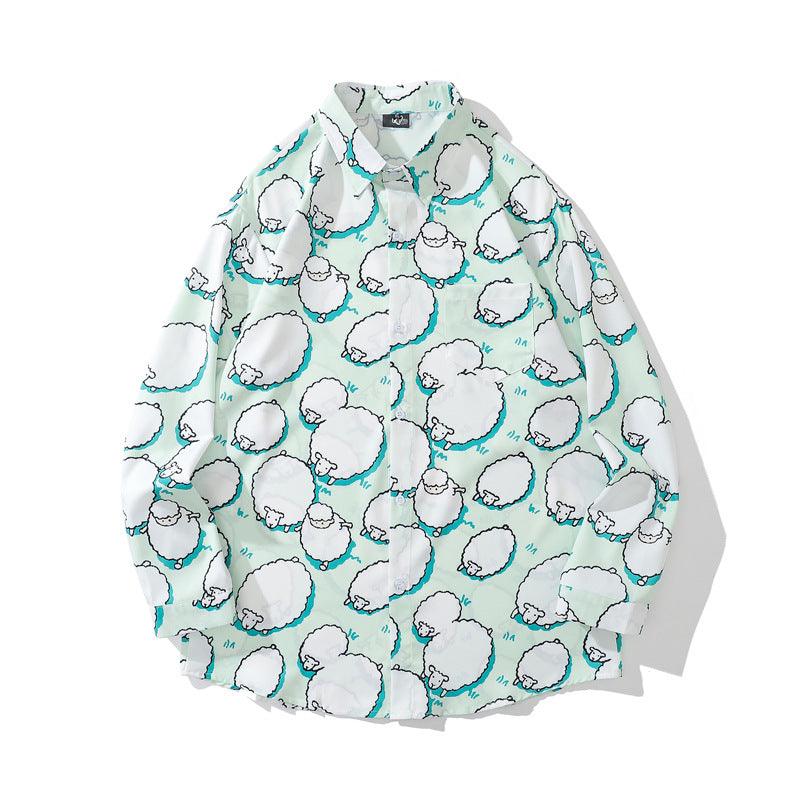 Light green button-up shirt with repeating white sheep pattern and collared neckline