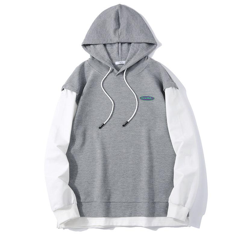Cotton hooded sweatshirt in light grey with drawstring hood, front pouch, and logo patch.