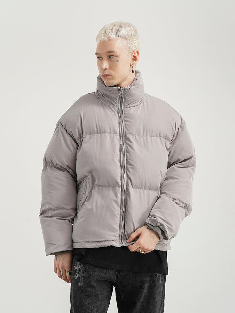 Light grey puffer jacket with stand-up collar and zipped front