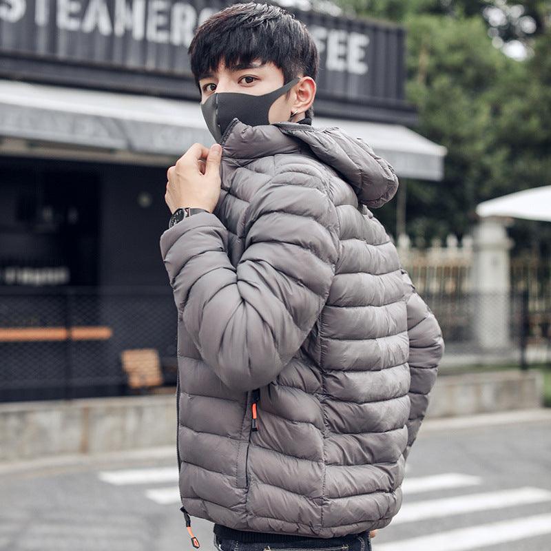 Men's hooded padded jacket in light gray, full-zip front with quilted baffles.