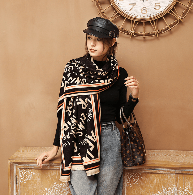 Black letter jacquard warm scarf with white and orange border stripes