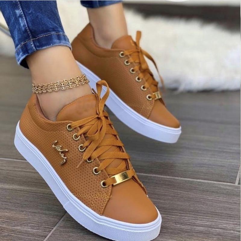 Women's flat lace-up sneakers, brown perforated upper with buckle strap