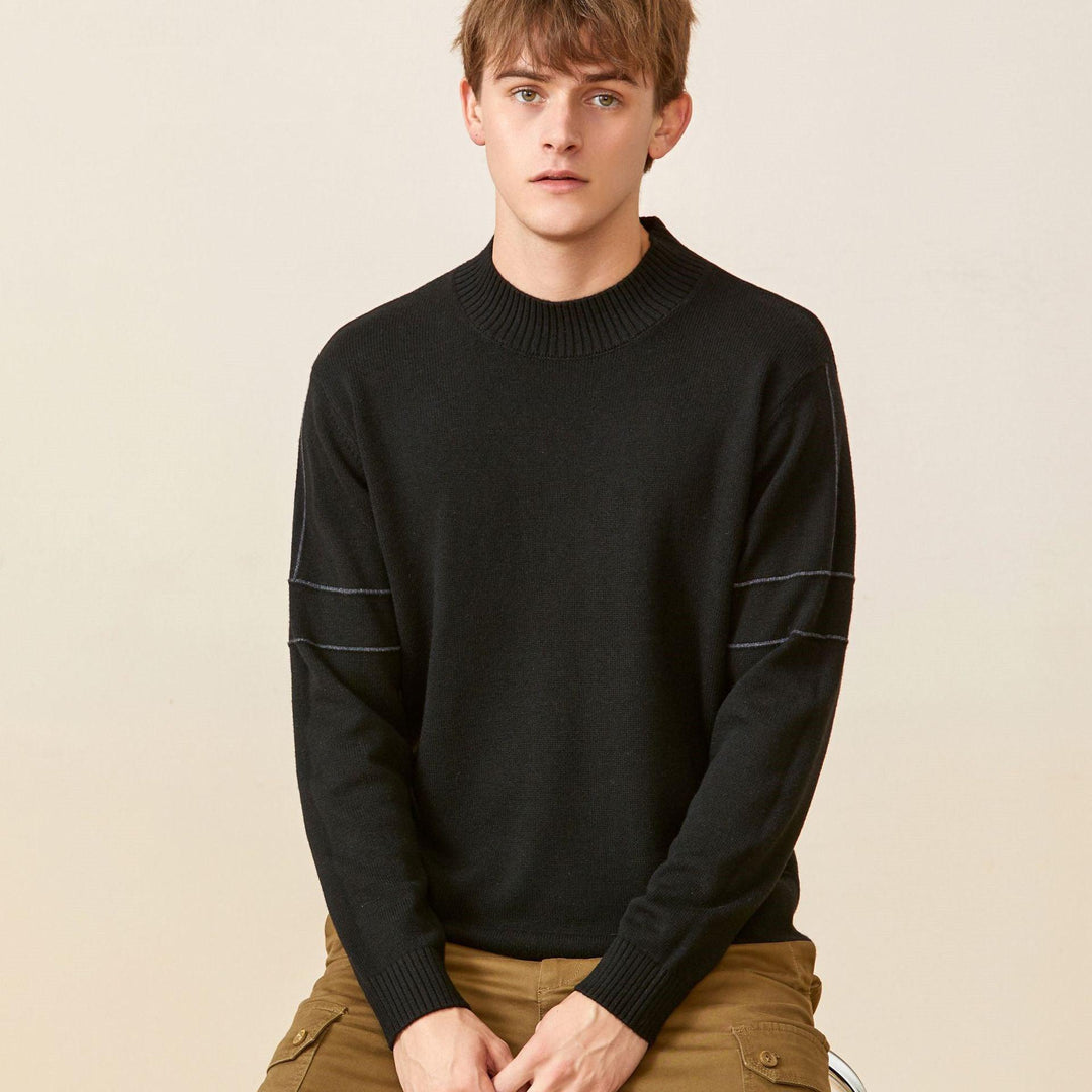 Black crewneck knit sweater with ribbed cuffs and threaded stripe detailing on sleeves.