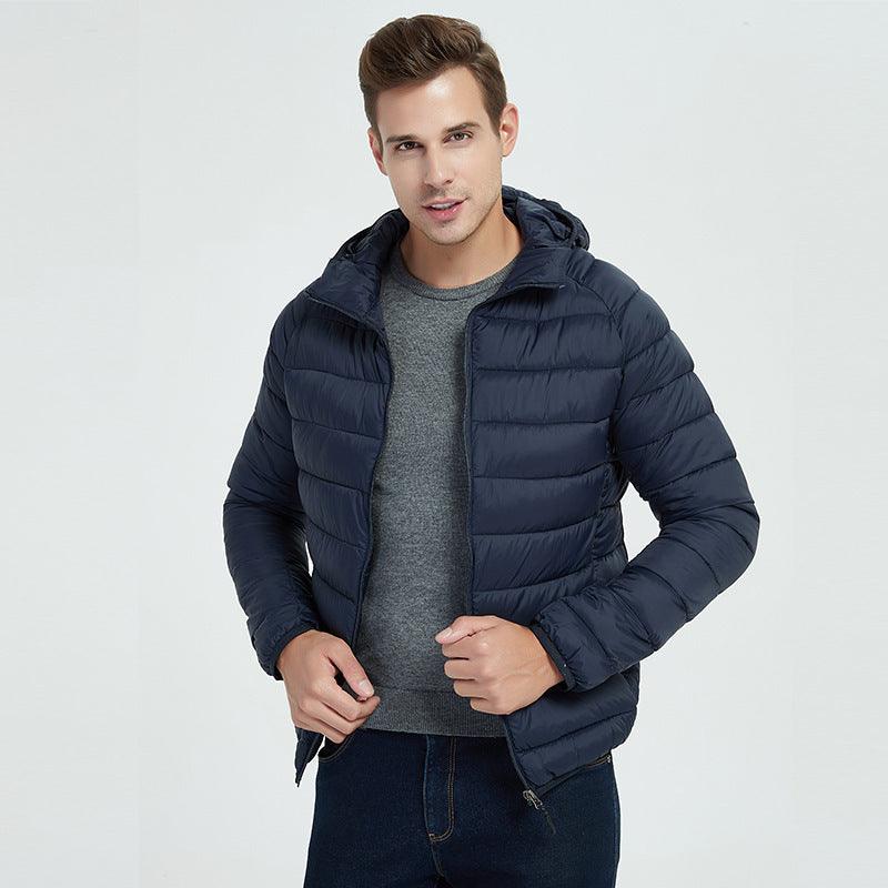 Men's navy down puffer jacket with hood, zip front and ribbed cuffs