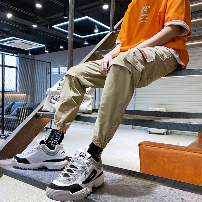 Men's khaki cargo jogger pants with ankle cuffs and side patch pockets