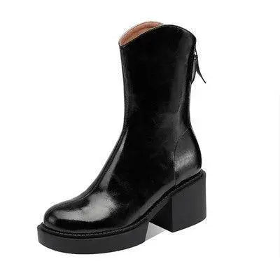 Black chunky-heel ankle boots with glossy finish and side tie detail
