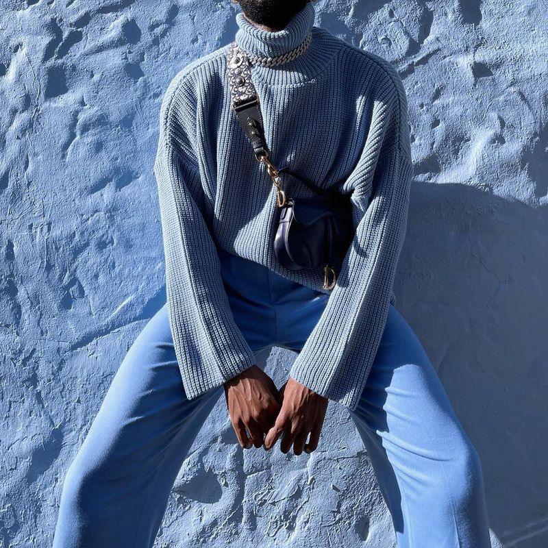 Light blue plush knit pullover sweater jacket with high turtleneck and long sleeves