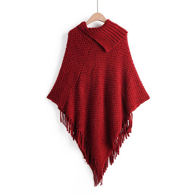 Red lapel tassel cloak sweater with two-button closure and long fringe hem