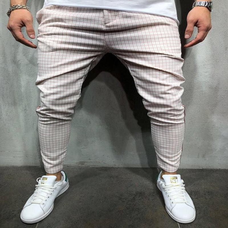Men's check-pattern jogger jeans in white with dark gray micro-grid, ankle cuffs
