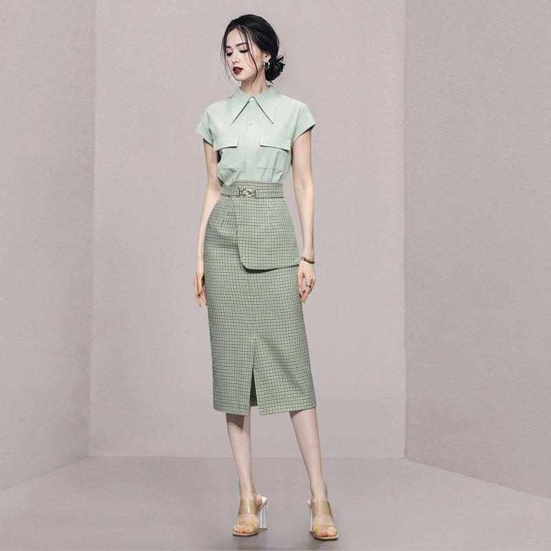 Green plaid skirt suit with mint collared blouse, belt, midi pencil skirt with slit.