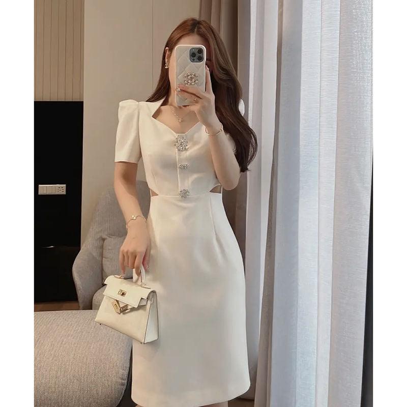 Off-white fitted midi dress, V-neckline with decorative buttons and short puff sleeves