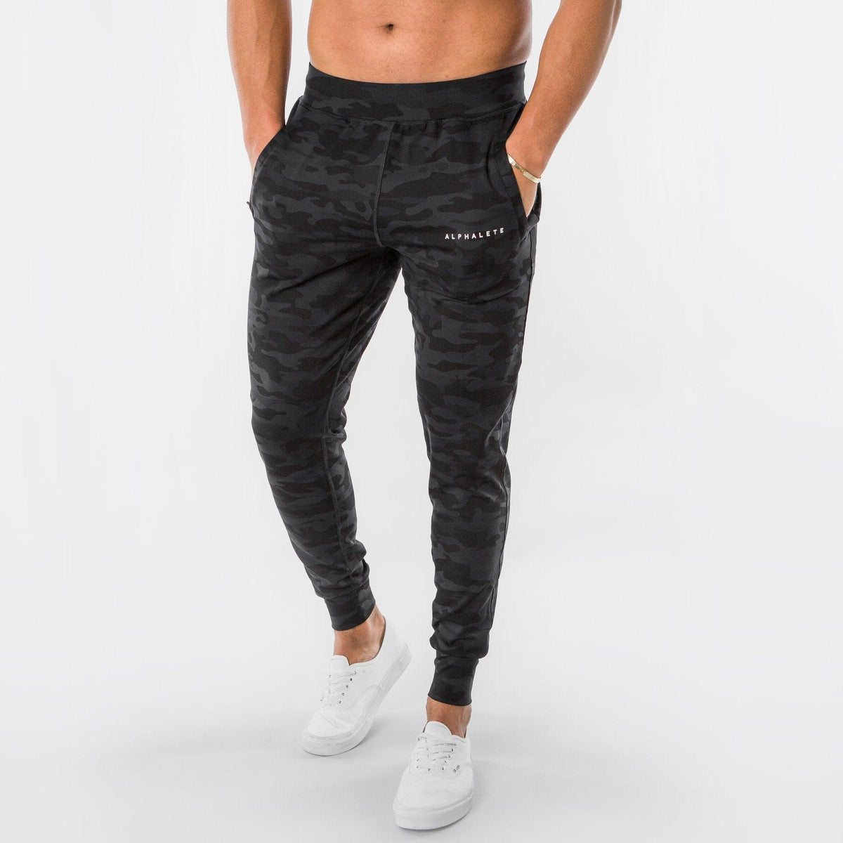 Men's black camouflage trousers, slim fit with tapered legs and elastic ankle cuffs