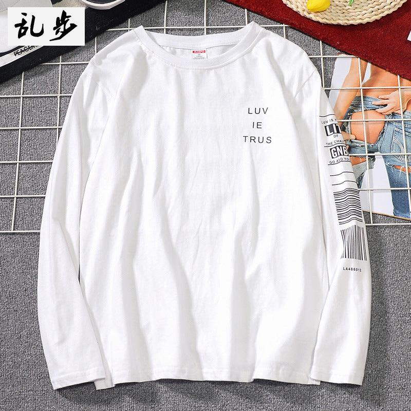 White long-sleeve shirt with stacked 'LUV IE TRUS' text on the chest.