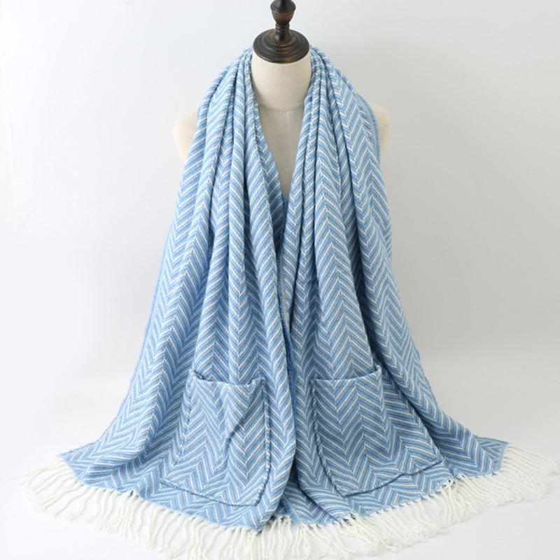 Women's pocket shawl, light blue chevron knit with front pocket and fringe trim