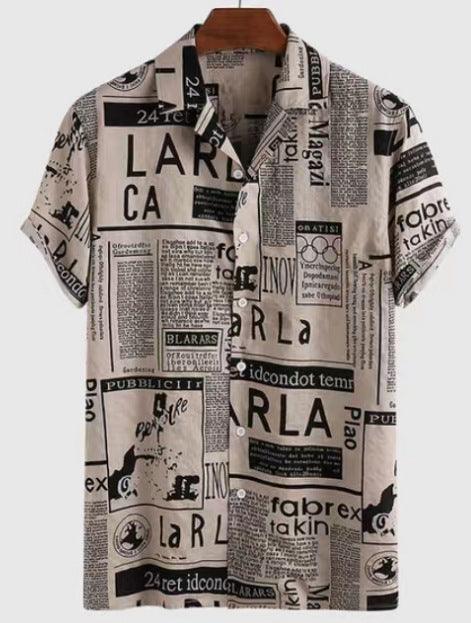 Men's Hawaiian shirt in light beige with scattered black newspaper-style print, short sleeves.