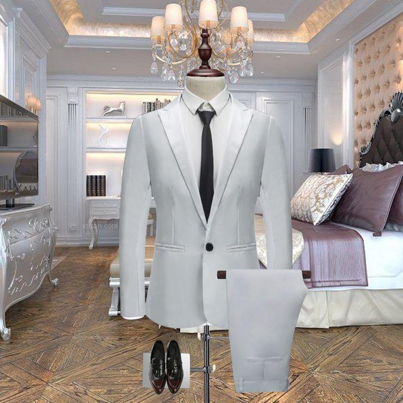 White single-breasted blazer jacket with matching trousers on a mannequin