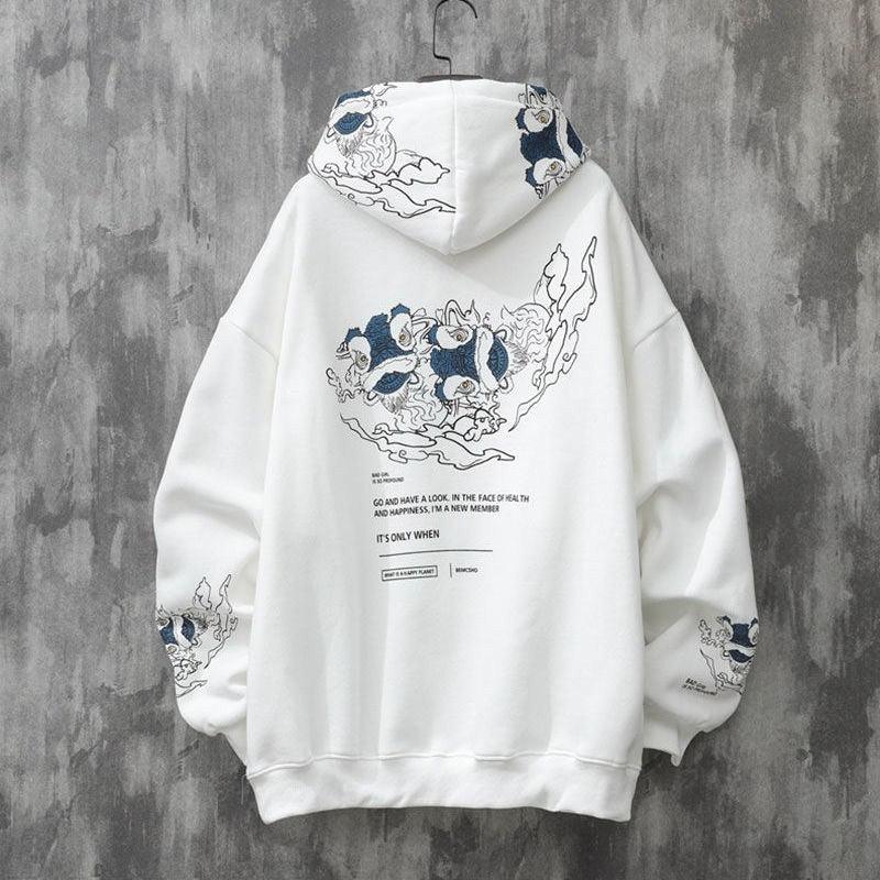 Men's white hooded sweater with blue back illustration and sleeve graphic accents