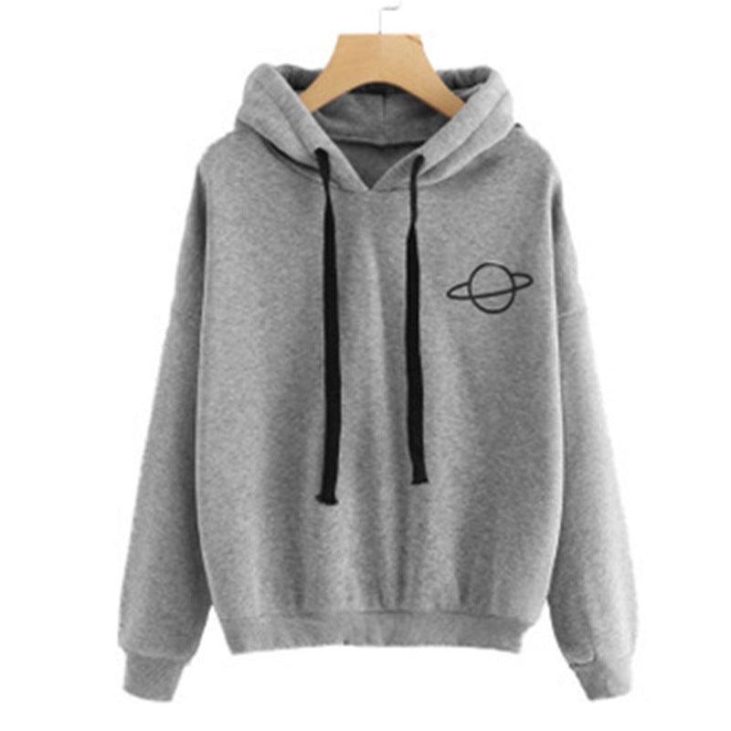 Grey pullover hoodie with hood, black drawstrings, front pocket, and small planet print